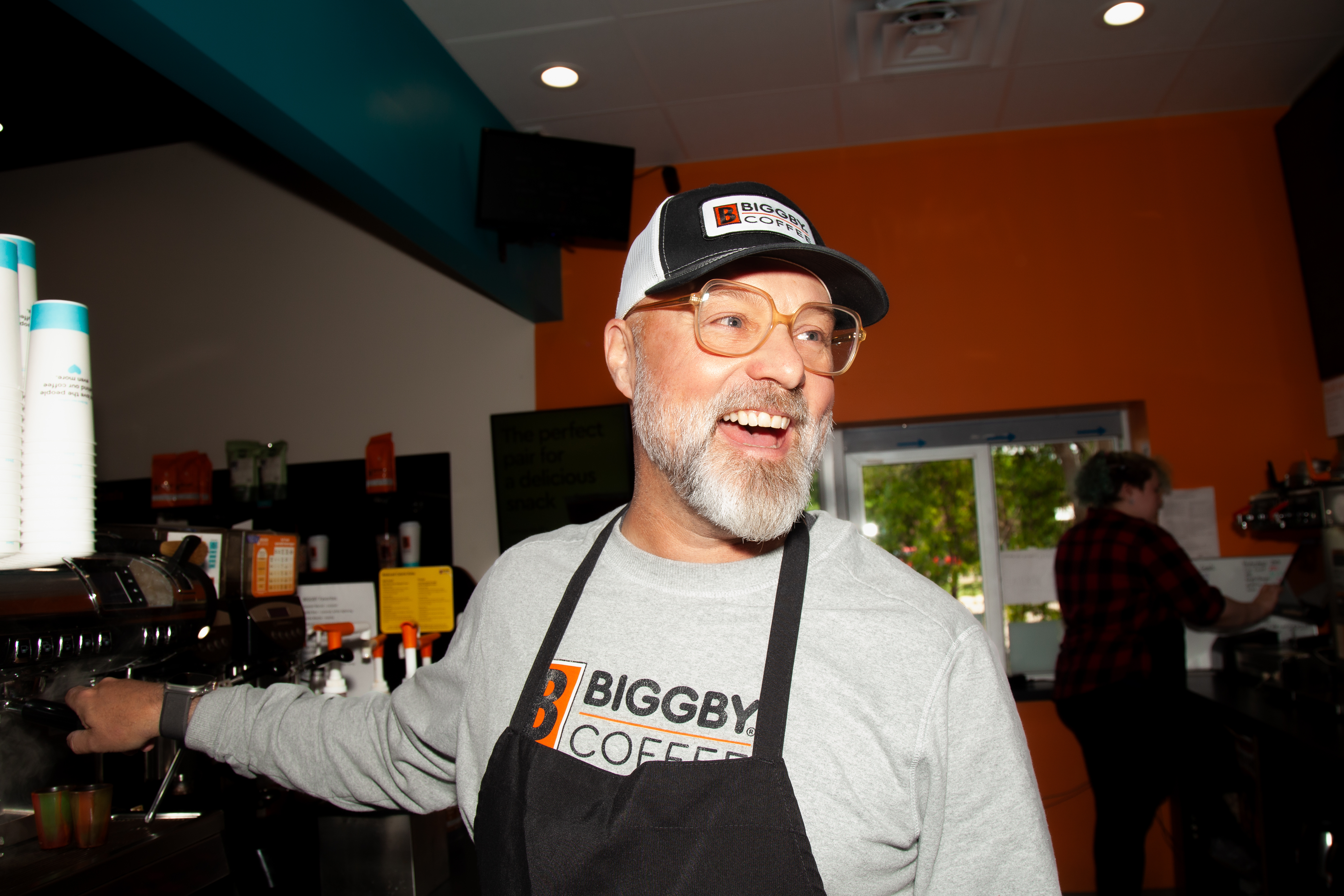 Mike working as a barista